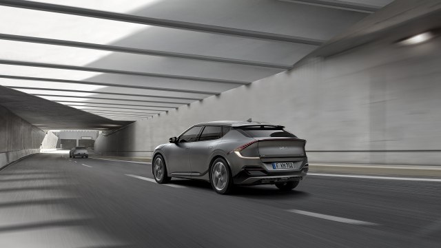 New 2022 Kia EV6 Crossover rear side view in tunnel