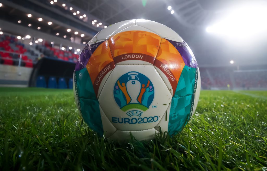 The weight of a soccer ball